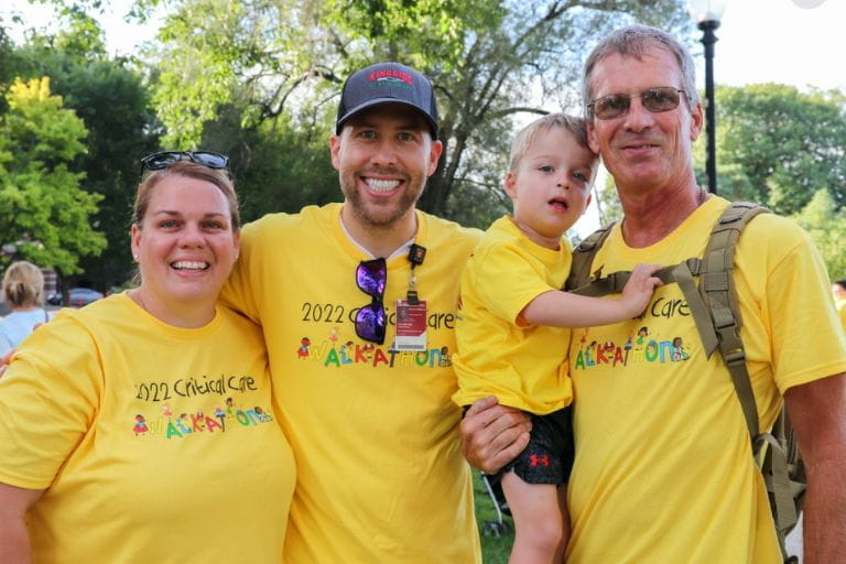 Benjamin Meinhardt with family members and Brian Leland, pictured in the middle, at the seventh annual Pediatric Critical Care Walk-a-Thon in 2022. Photo courtesy of Riley Children’s Health.