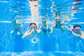 Children swimming in a pool
