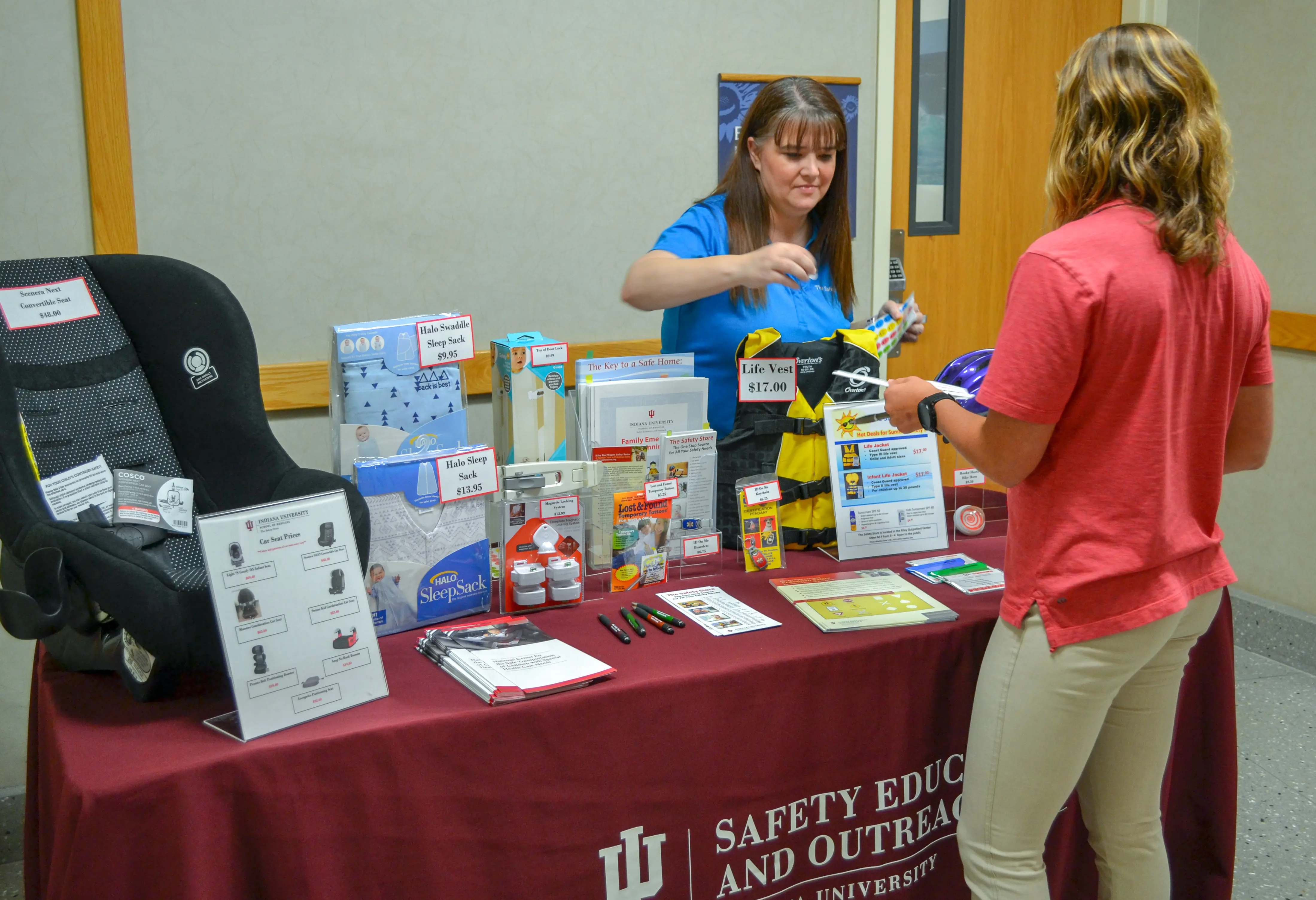 Pediatric Safety Education and Outreach staff explaining child safety