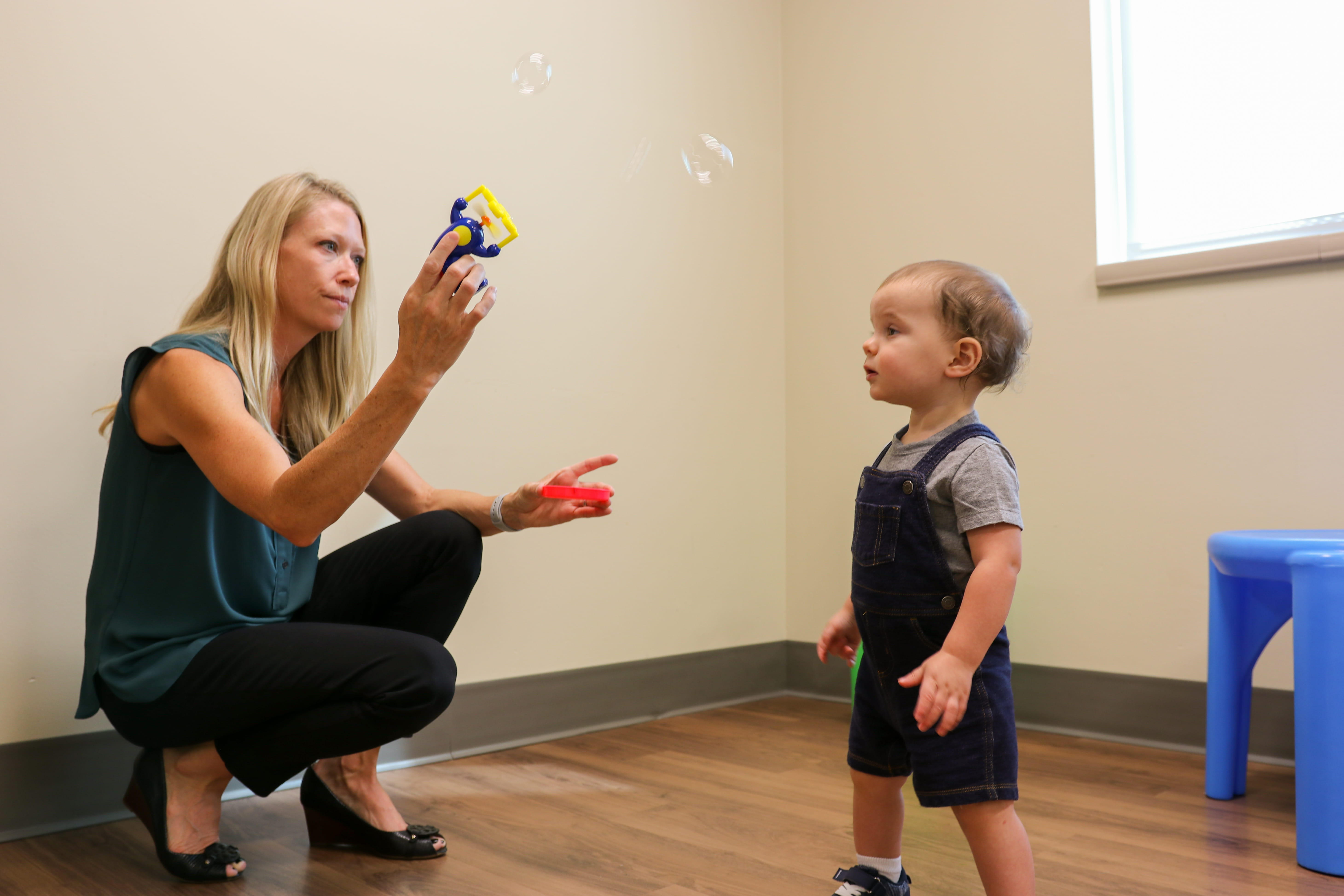 Dr. McNally Keehn and young child; Early Autism Evaluation Hub