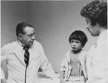 Dr. Heubi and patient