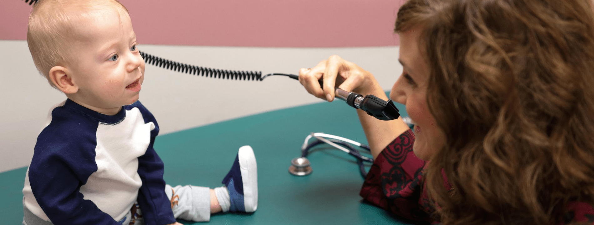 Child Neurology nurse practitioner with neuro-NICU follow-up patient