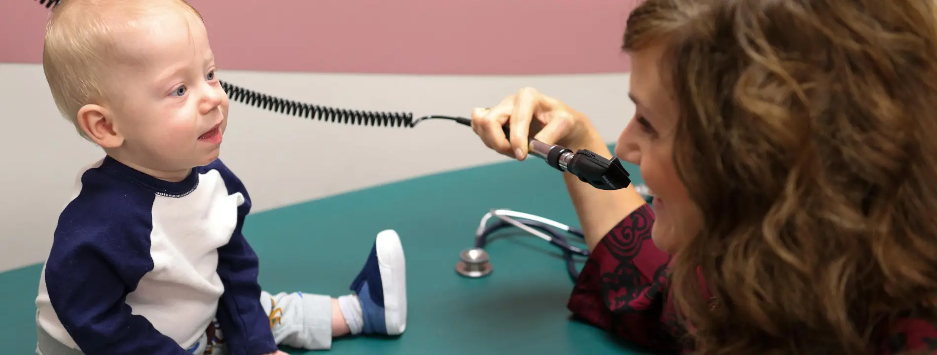 Child Neurology nurse practitioner with neuro-NICU follow-up patient 
