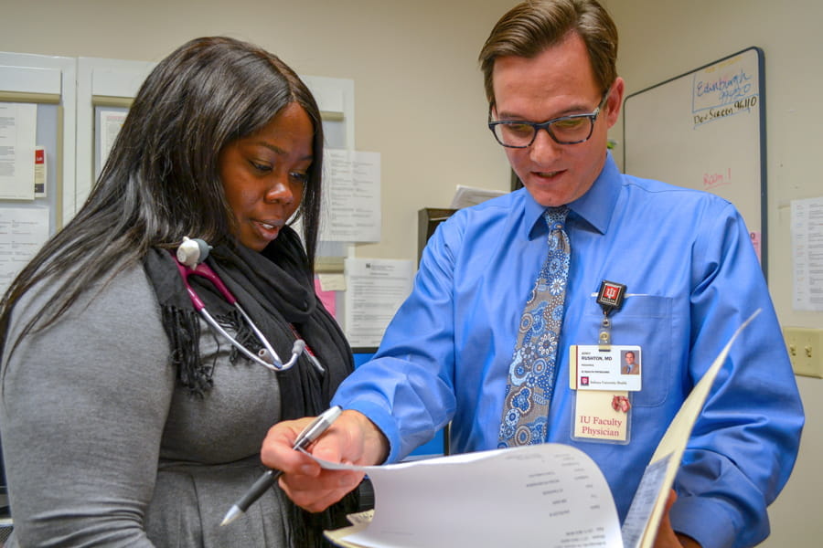 faculty and resident work together