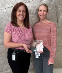 Angela Paxton receiving the Family Leadership Recognition Award, pictured with Dr. Rebecca McNally Keehn