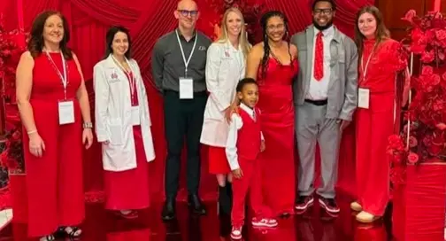 HEART Lab team, including Angela Paxtion, Brandon Keehn, and Rebecca McNally Keehn with others at the Red for Riley 