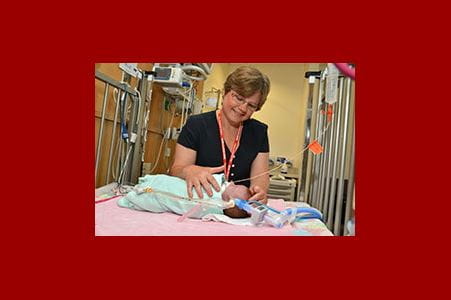 Provider cares for an infant.