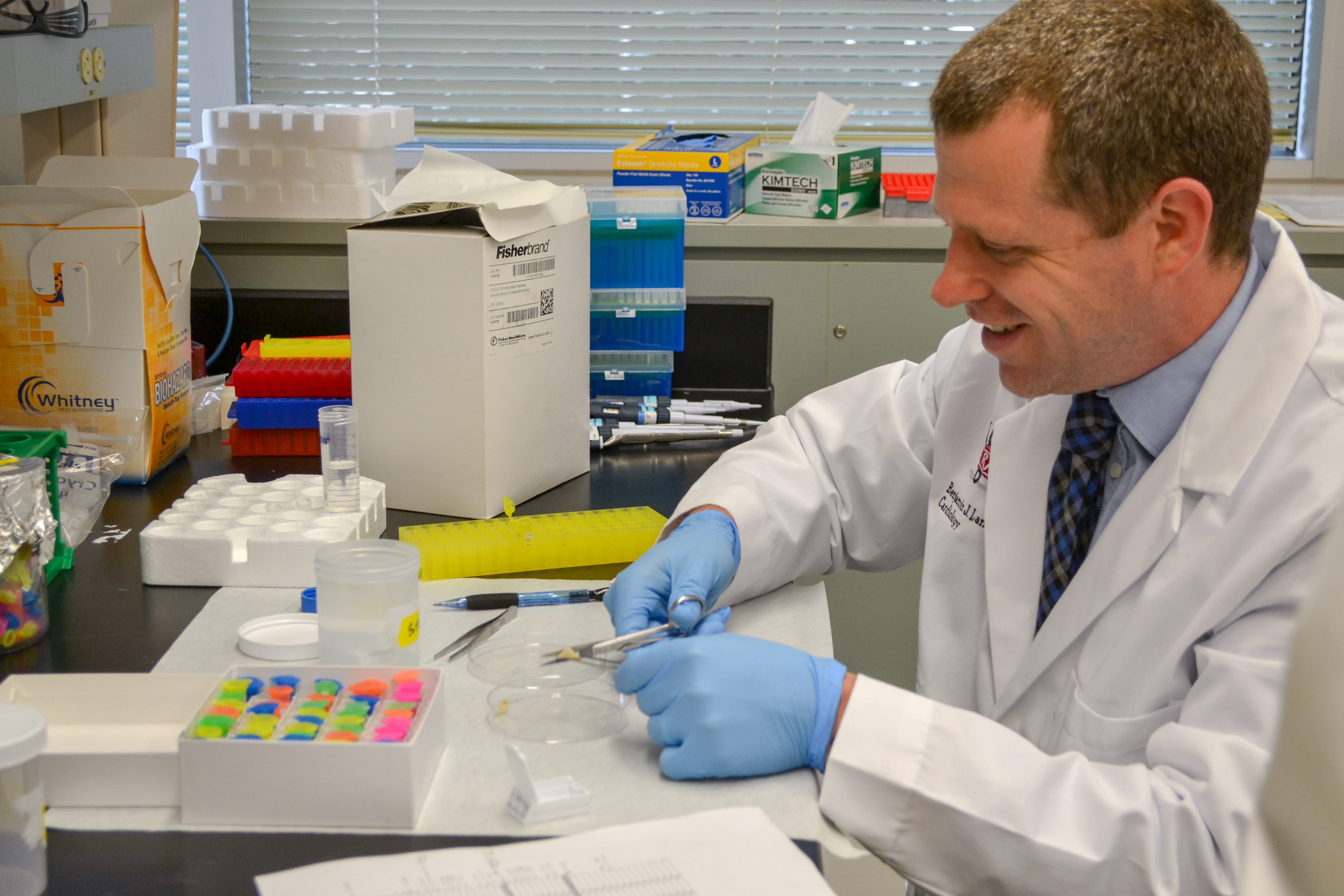Benjamin Landis, MD, works in his lab in the Wells Center for Pediatric Research