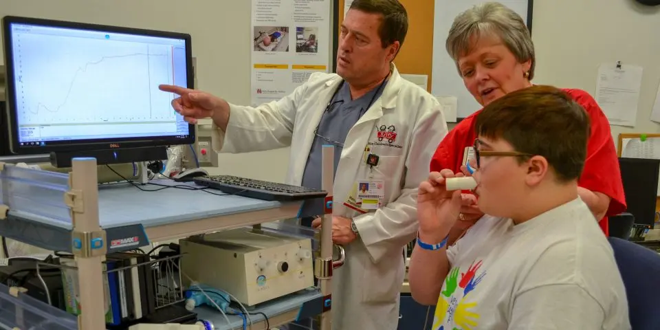 Care team running test on a patient