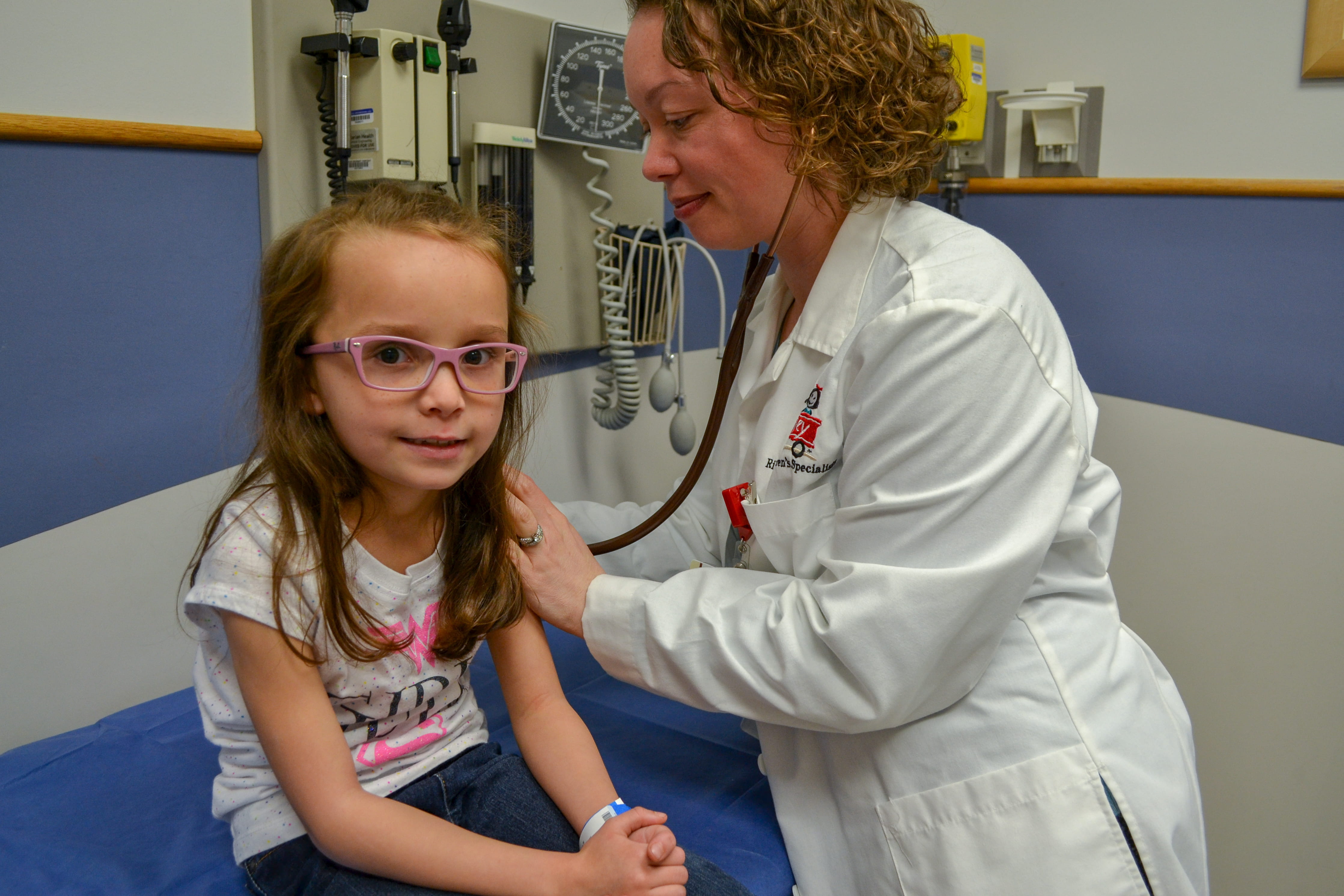 Nadia Krupp, MD, works with a patient in asthma clinic