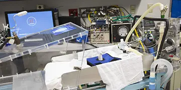 Hospital bed with monitors and equipment