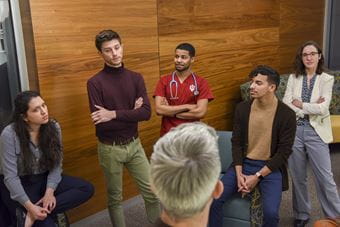 OutCare team members listen to psychiatry resident, Dustin Nowaskie, MD. From left to right, Sara Garcia-Dehbozorgi, Jordan Nowaskie, Jared Riley, Christopher Roman and Abby Hadley.