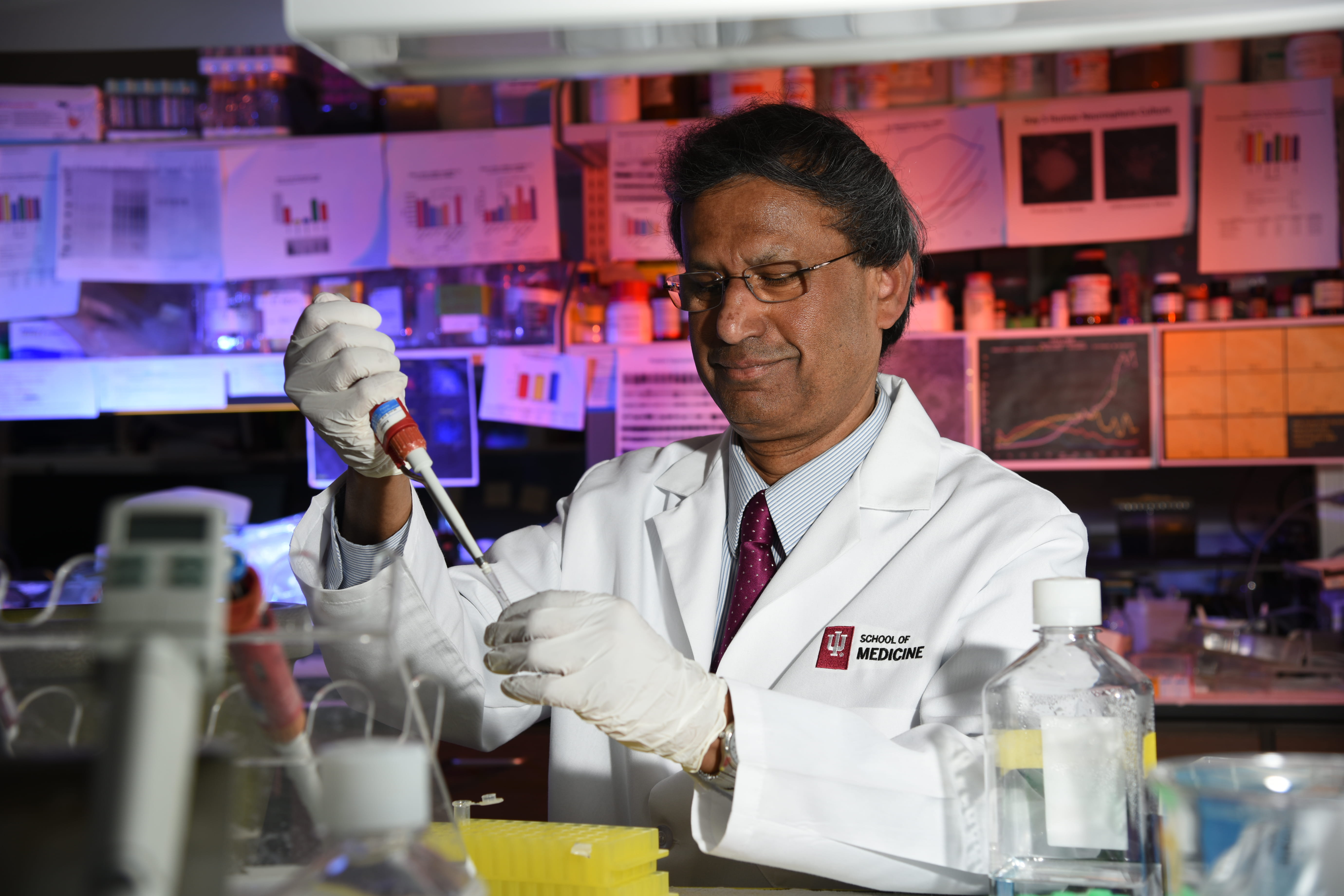 a researcher prepares a sample in the lab