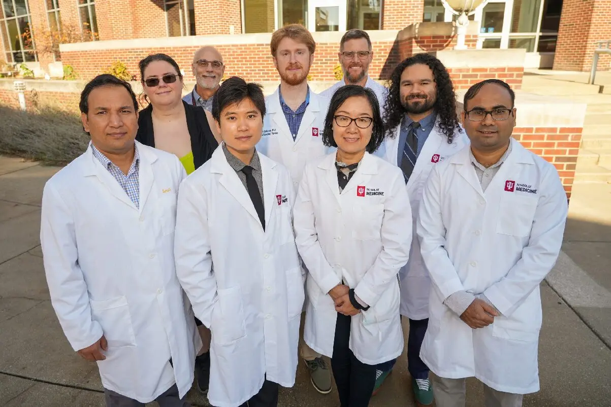 a group of residents in white coats