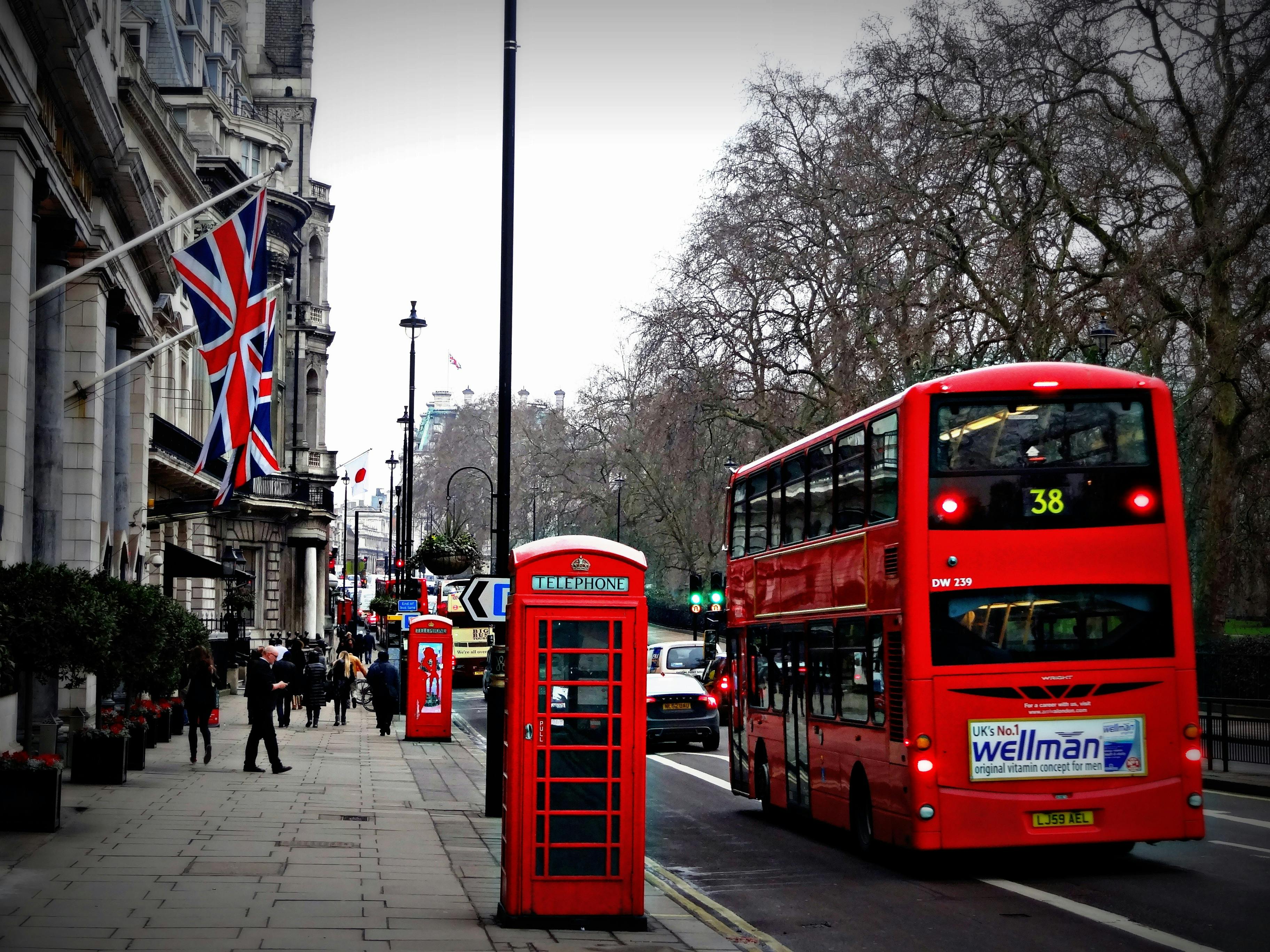 A large group of students pose for a photo in London.