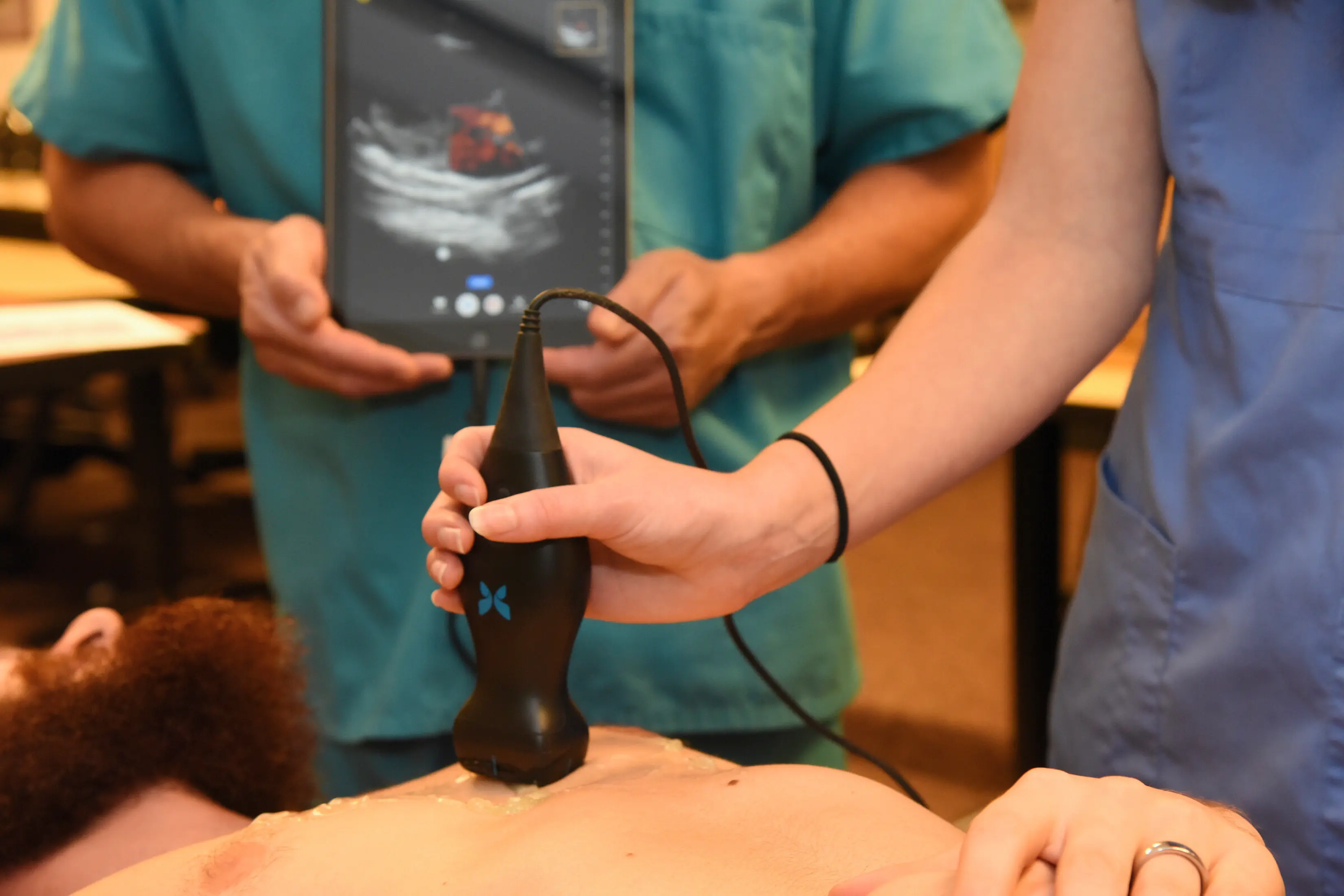Two students practice point-of-care-ultrasound