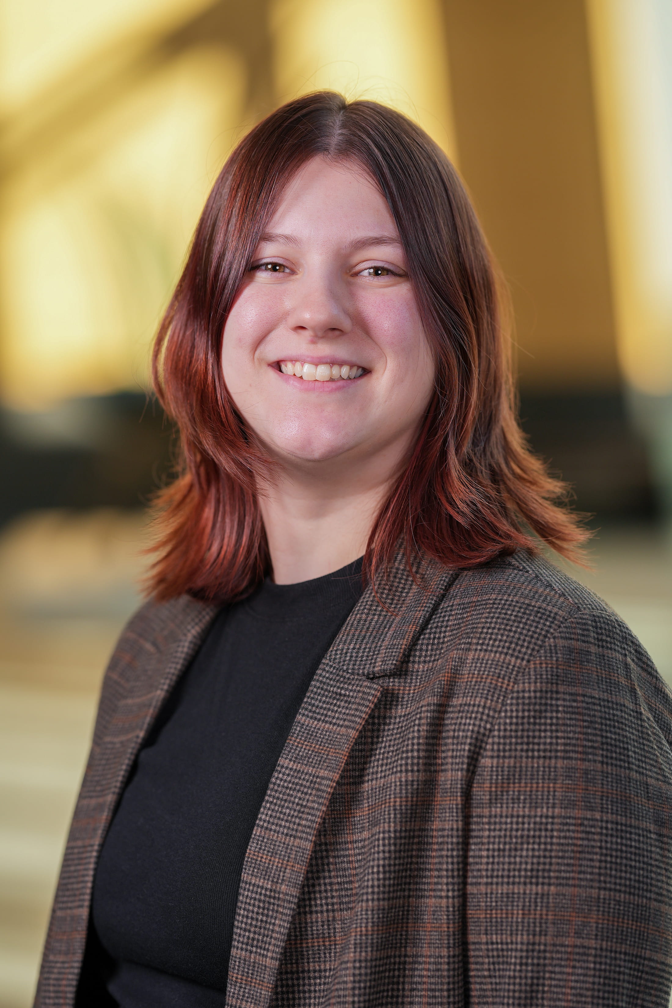 Headshot of Zoe Hagymasi.