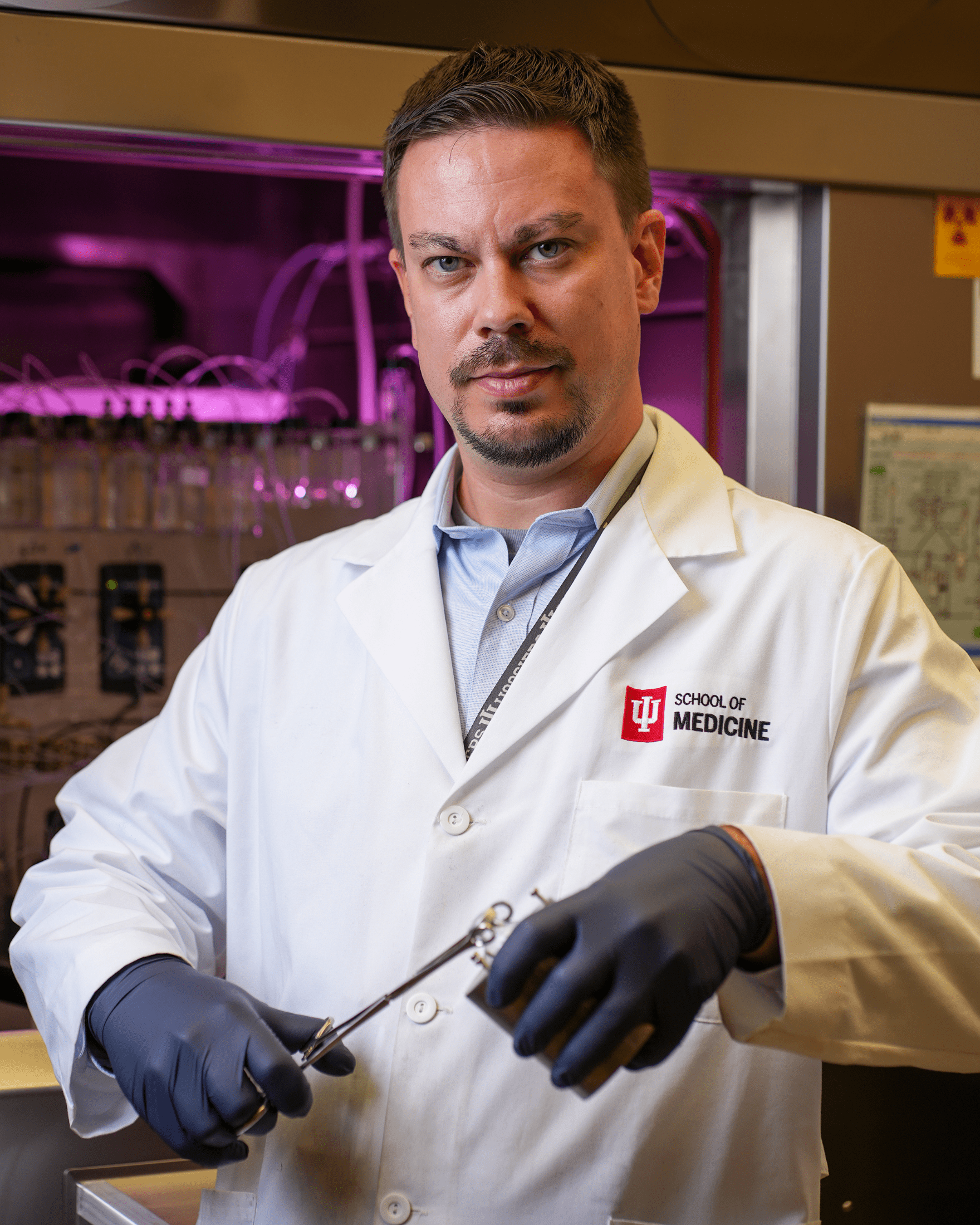 Image of a male researcher.