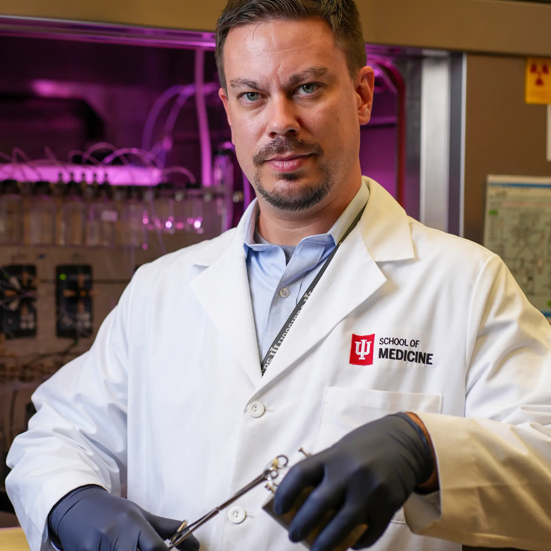 Image of a male researcher.