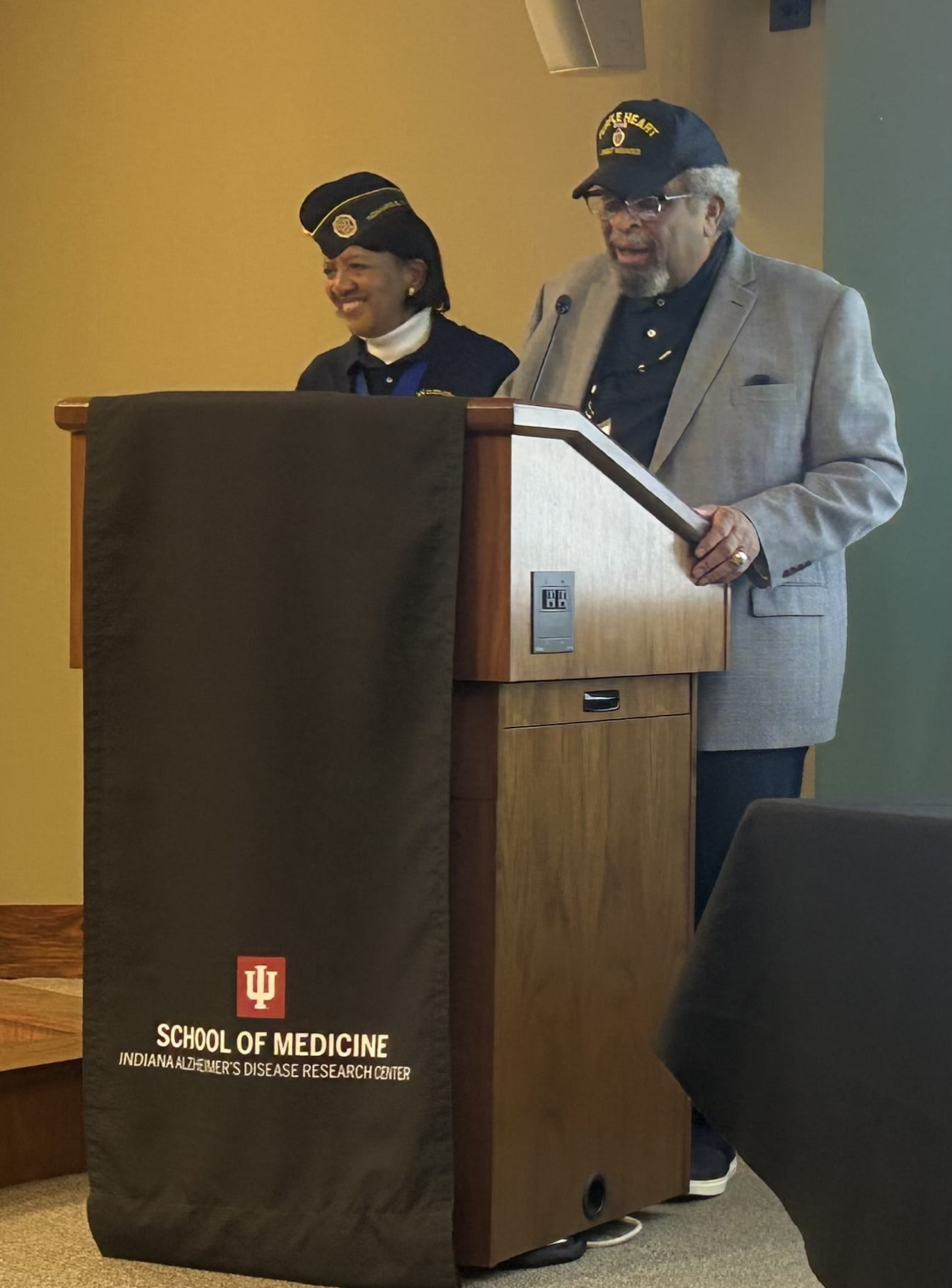 Ralph Richards and Mary Aurtrey memoralize Brady Brooks at the Martin Caregiver Symposium in November 2025