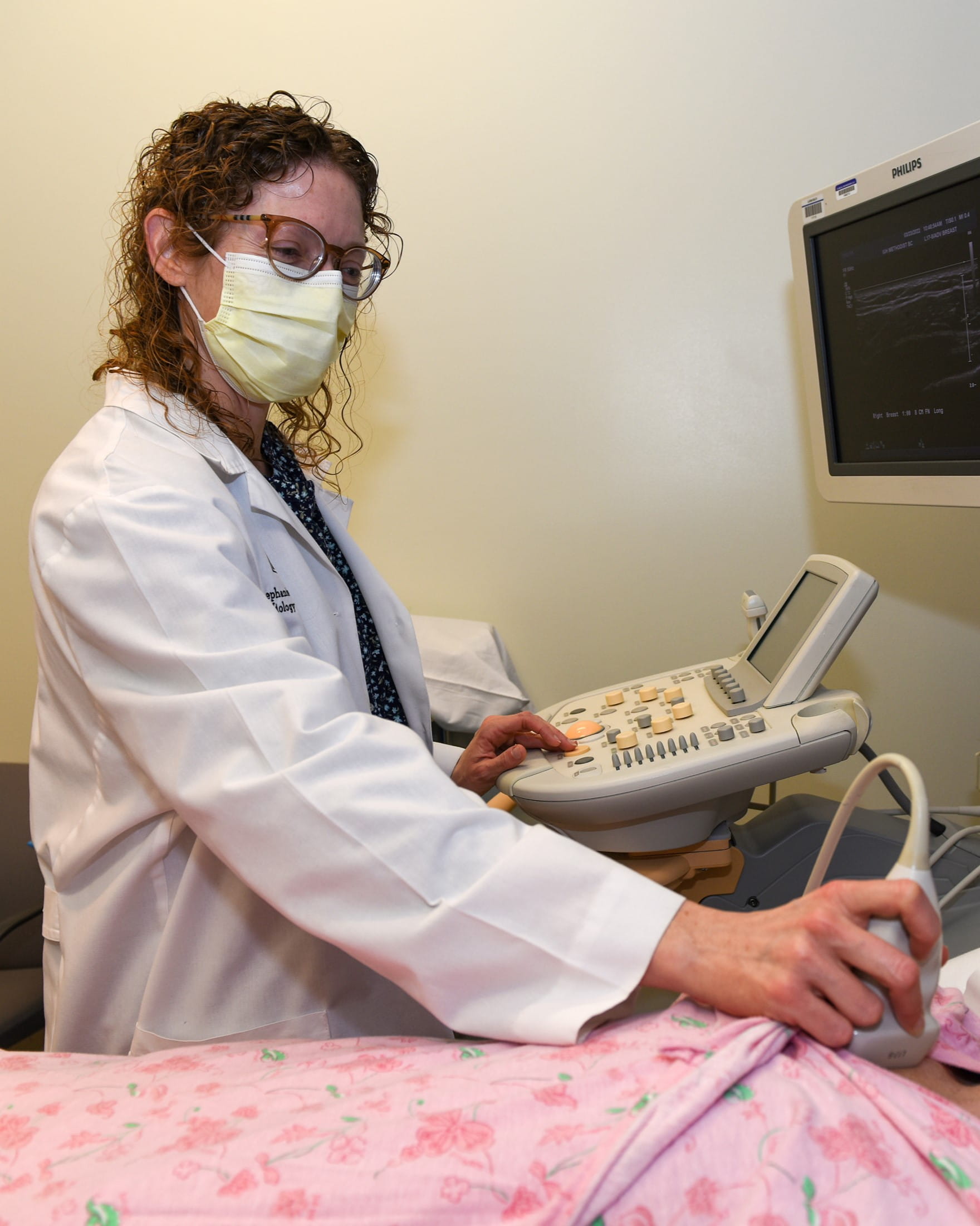 Radiologic technologist conducting an ultrasound.