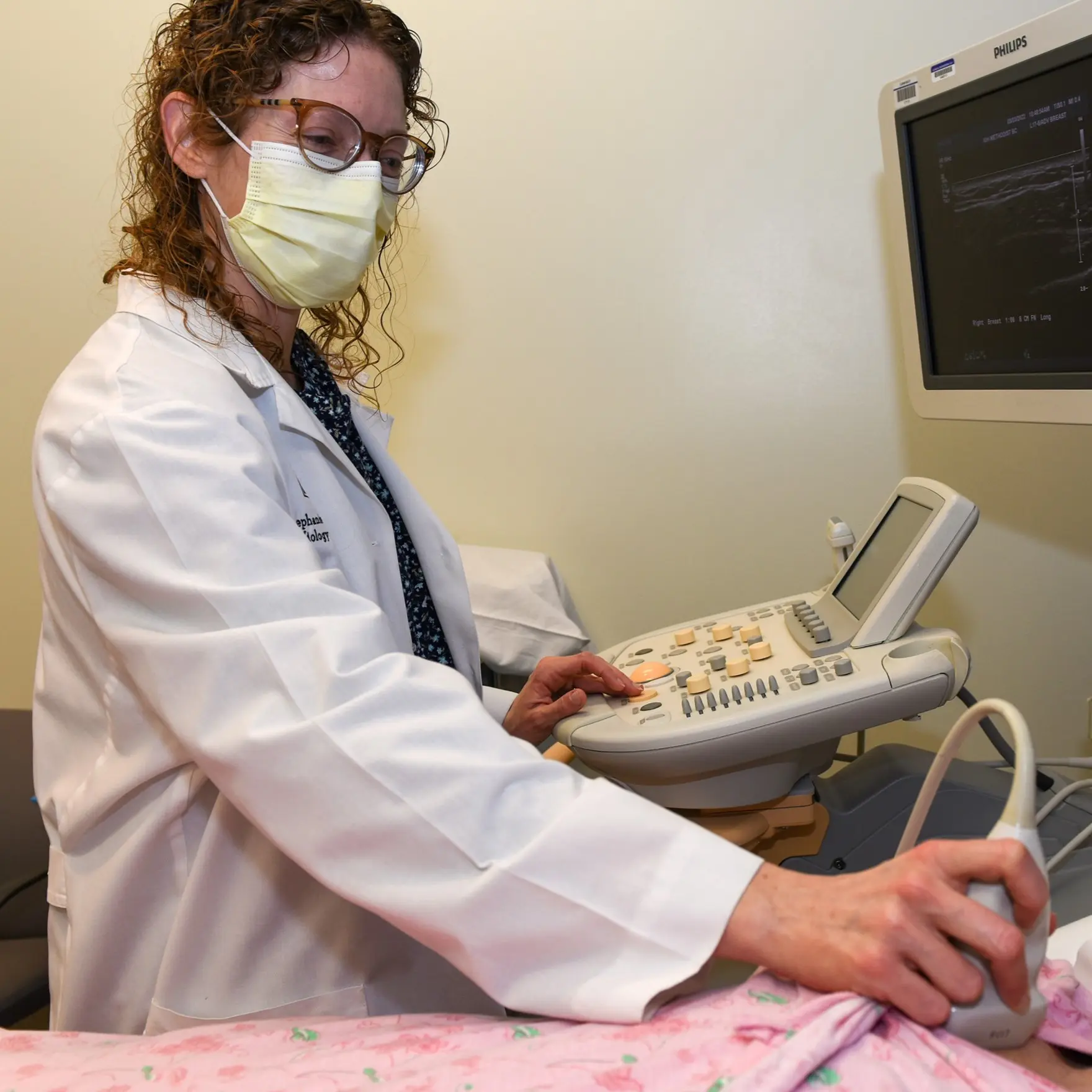 Radiologic technologist conducting an ultrasound.