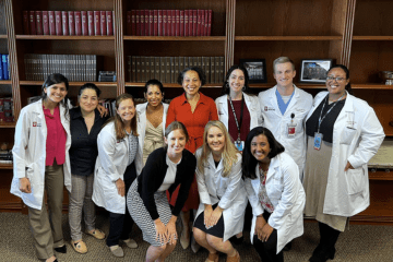 Diverse group of residents with visiting professor