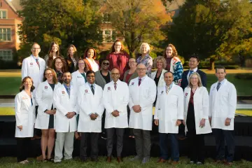Fall 2023 Group picture of Dept of Surgery Education Team, surgical leadership in the white coats