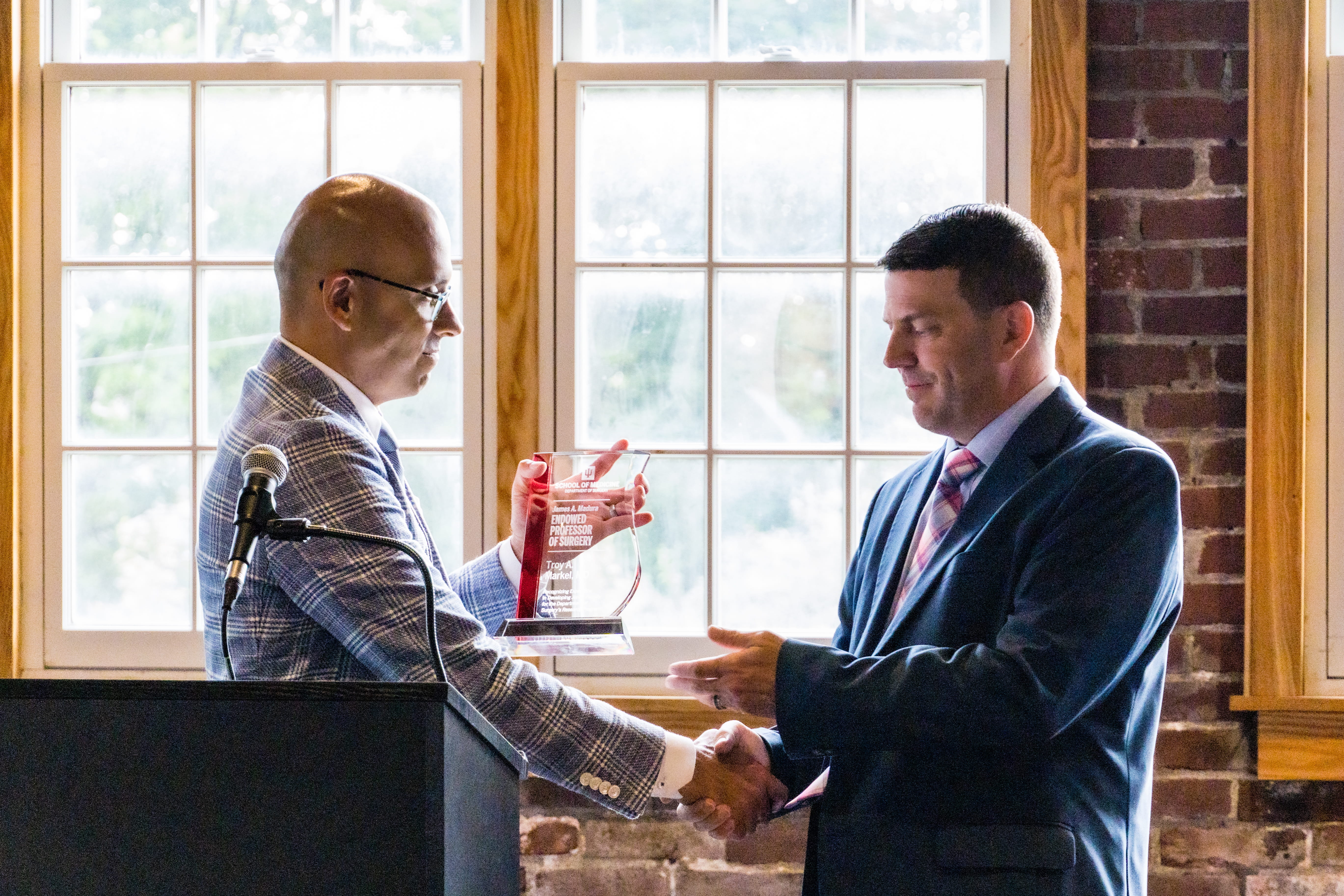 Dr. Markel Receiving his award