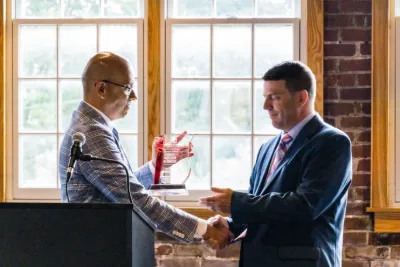 Dr. Markel Receiving his award