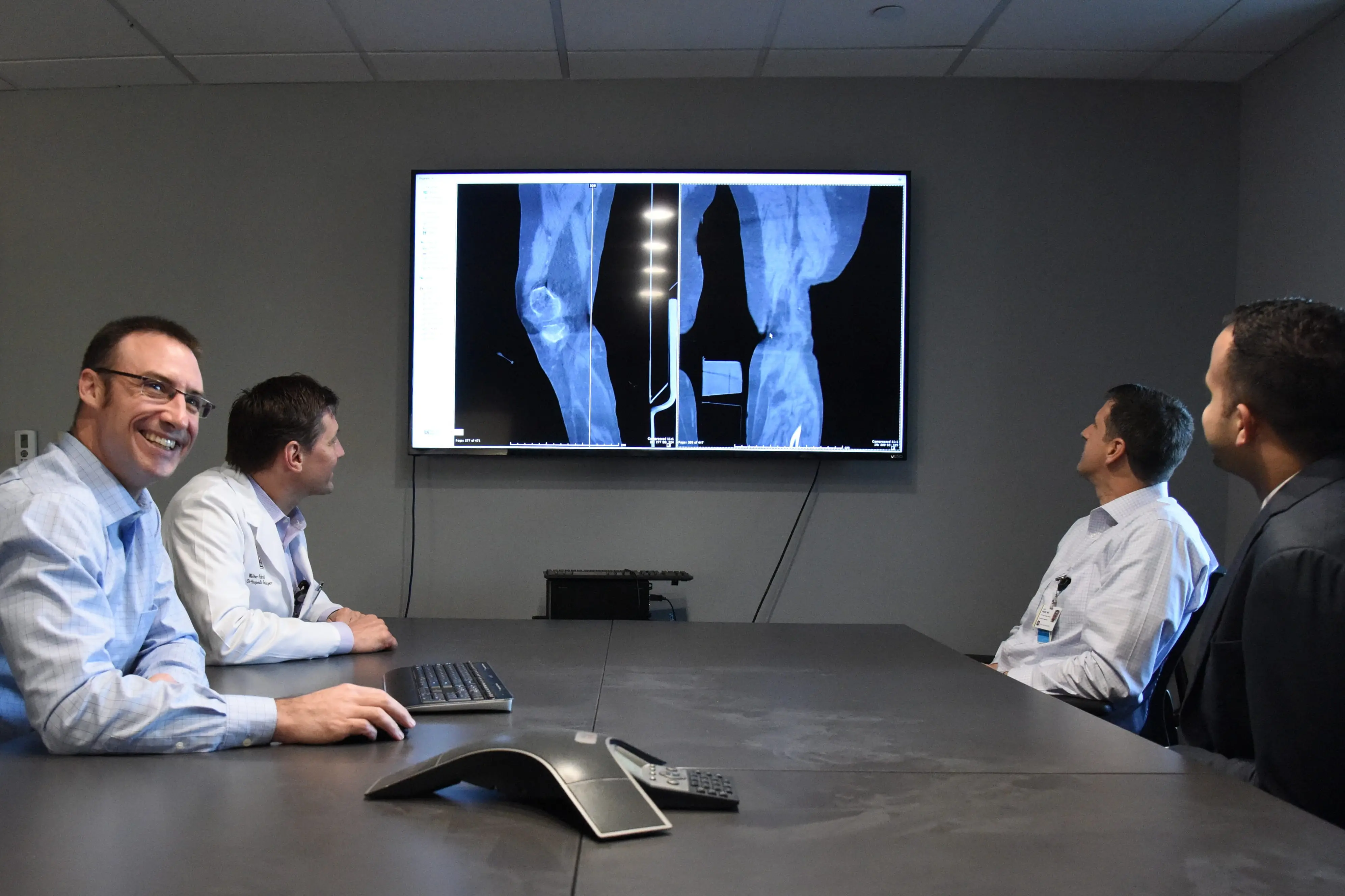 orthopedic surgeons reviewing a case together