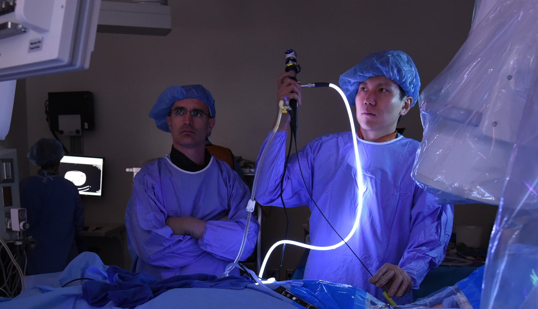 Isamu Tachibana, MD and Tim Large, MD in a surgery at IU Methodist Hospital