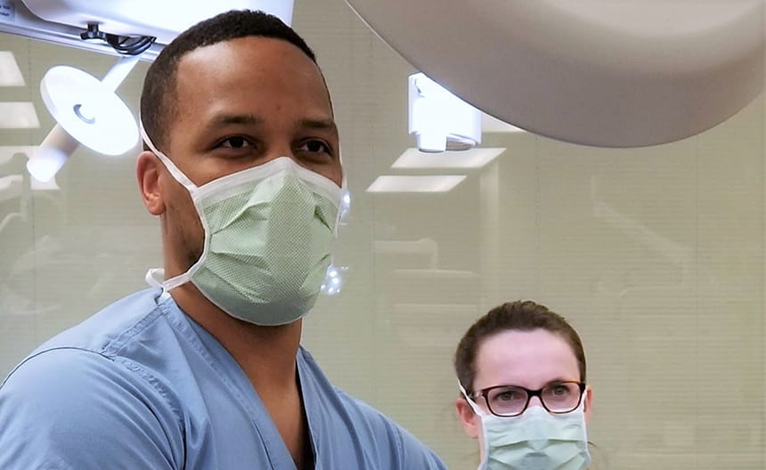 Adrian Simien, DO in cadaver lab