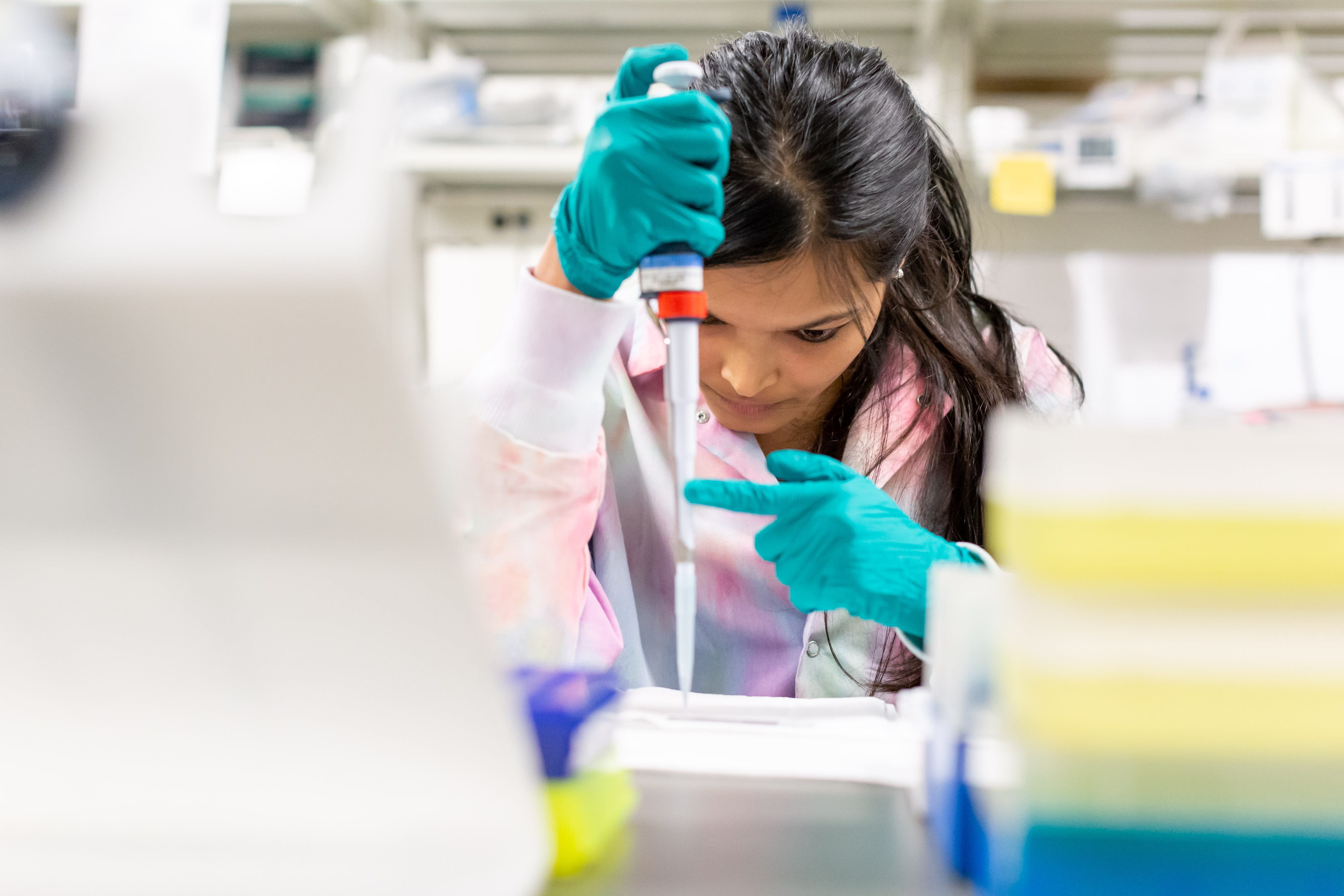 a grad student prepares a sample in jason meyer's lab