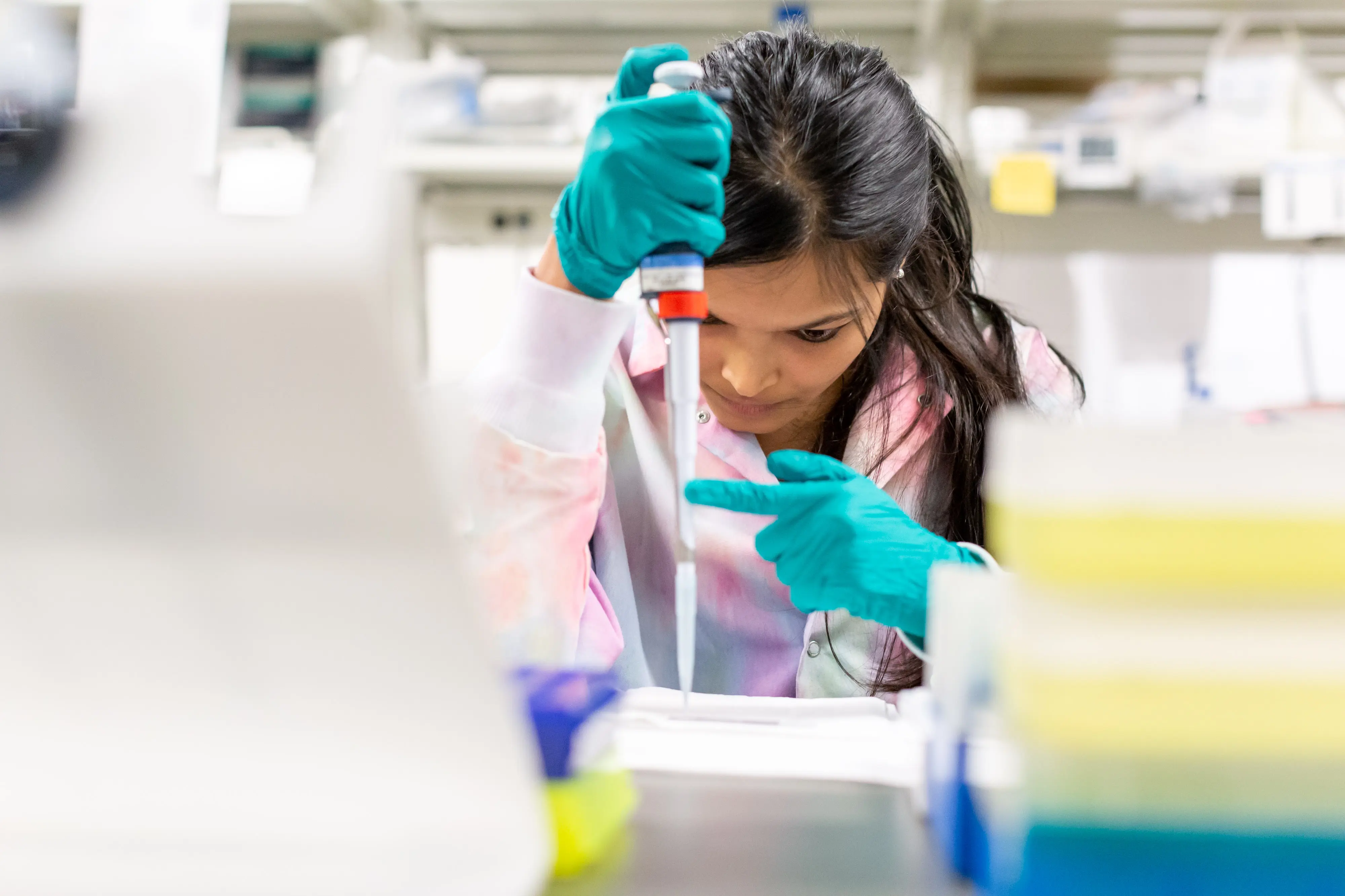 a grad student prepares a sample in jason meyer's lab