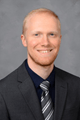 headshot of John Damrath