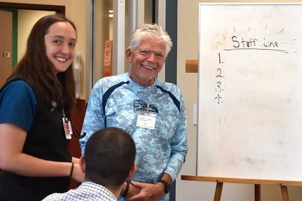 A student and partner from the Indianapolis Student Outreach Clinic consult about an upcoming project.