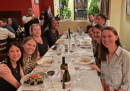 Members from the Gaston Lab around a dinner table