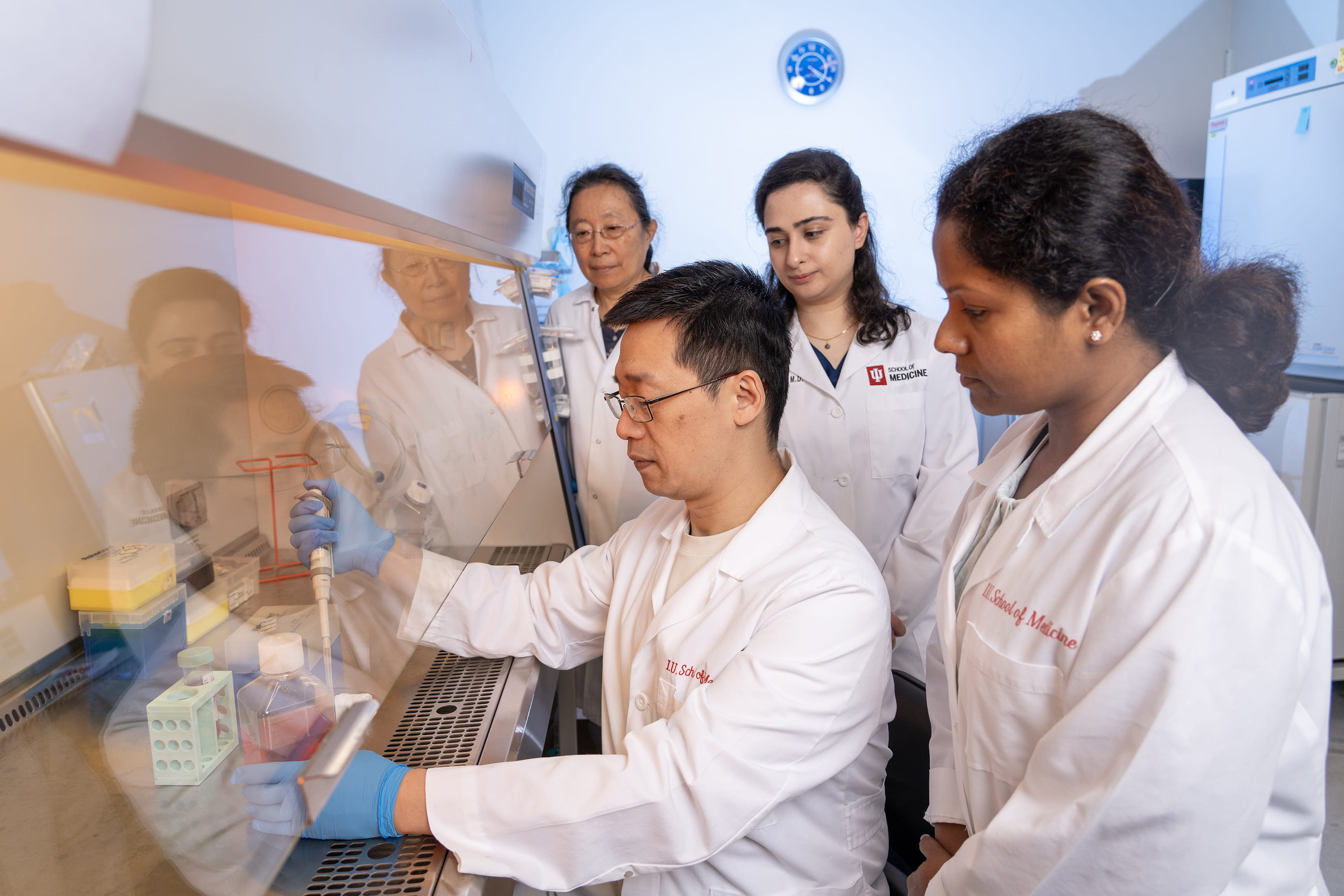 Dr. Deng working in the lab