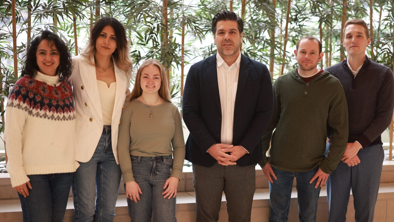 members of the shahbazi lab in the cancer center lobby
