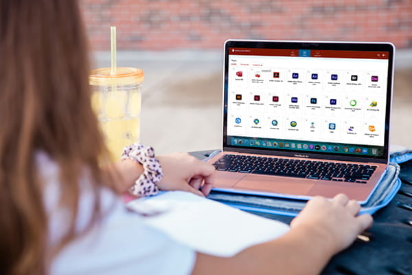 A student accesses IU AnyWare on a laptop