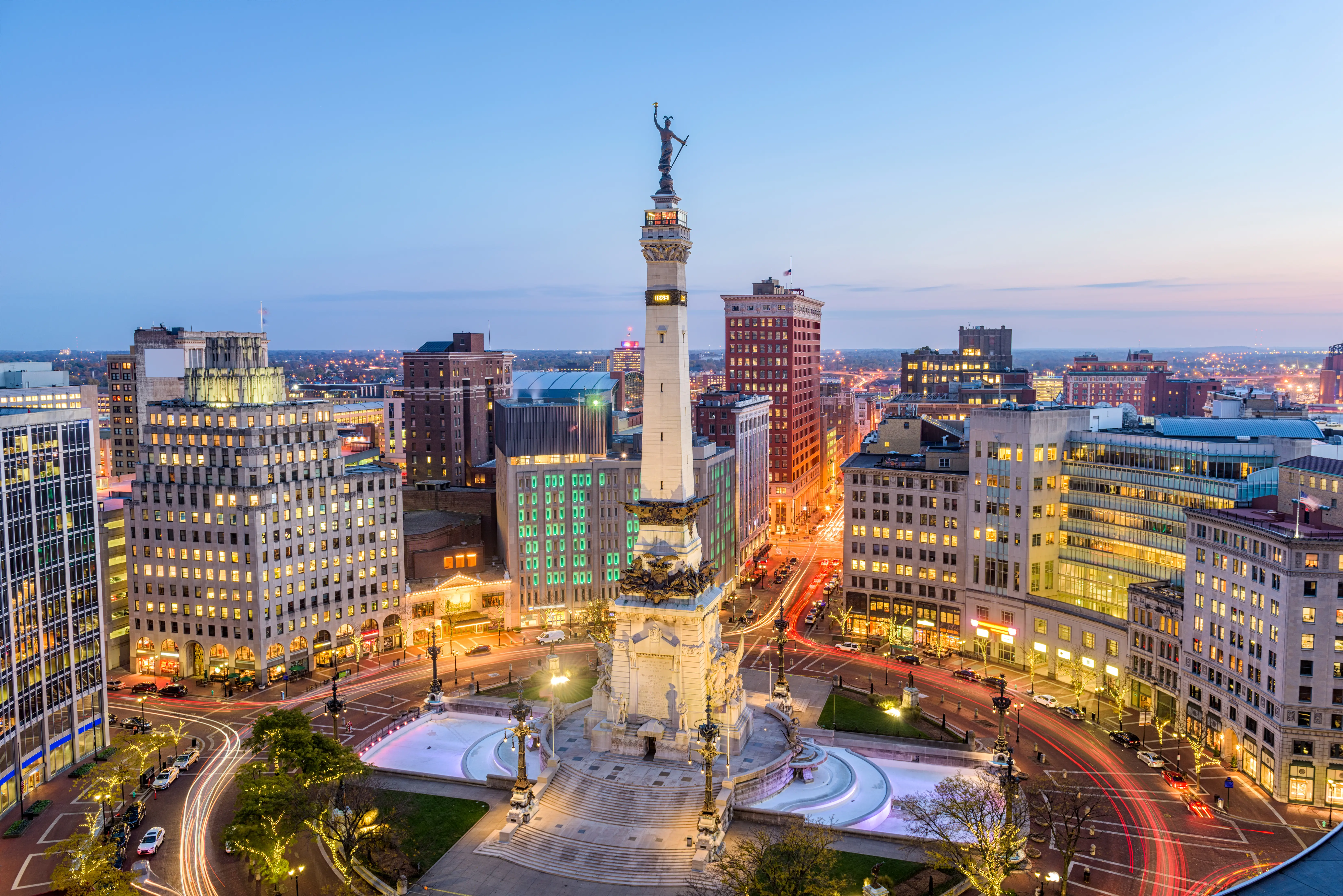 aerial photo of monument circle in indianapolis at sunset