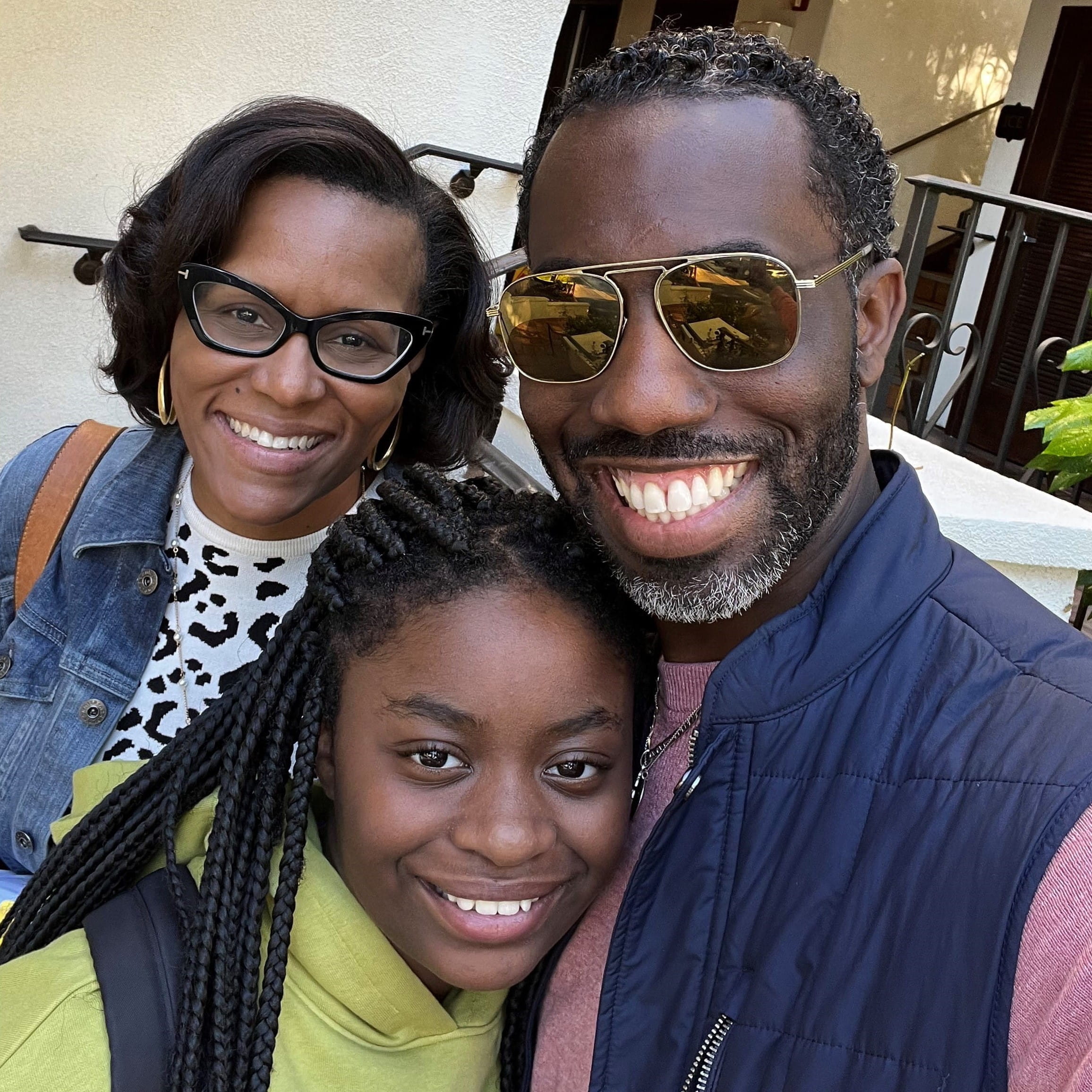 Brownsyne Tucker Edmonds with her husband and daughter