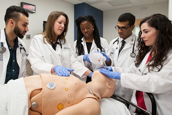 A faculty member at an AAMC member institution teaches medical students.