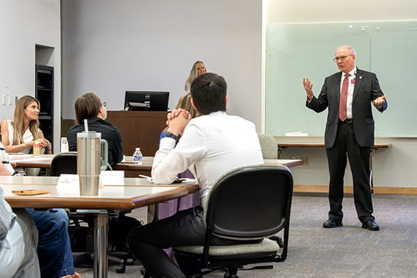Dean Jay Hess speaks to LAMP participants in May 2025