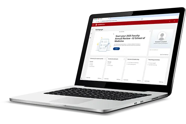 A laptop is shown with an open screen showing the home page of Elements online