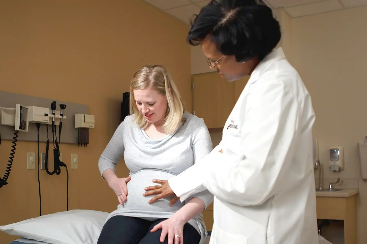 brownsyne tucker edmonds sees a pregnant patient in the clinic