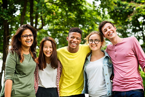 A group of college students smiling