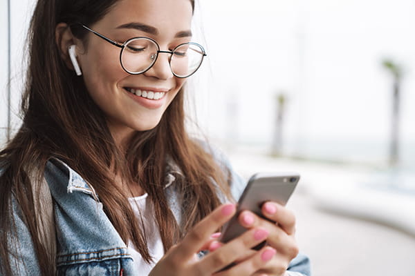 College student on her phone