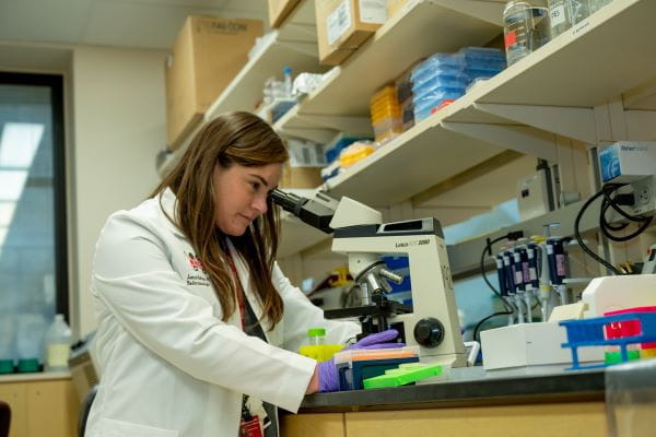 Jamie Felton, a diabetes researcher, working in the lab setting.
